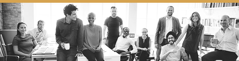 Black and white image of a brand stakeholders, employees. An office full of diverse employees.