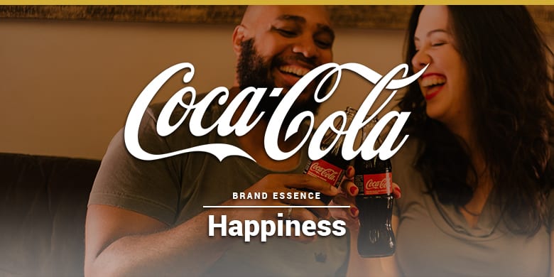 Coca-cola's brand essence is happiness. Man and woman enjoying a coke.