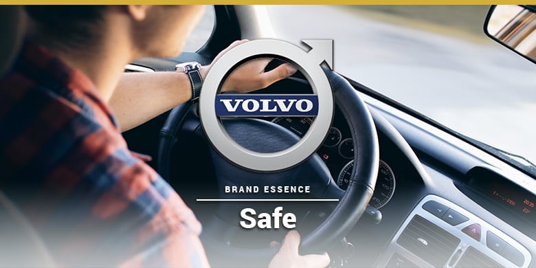 Volvo's brand essence is safe. Woman driving a Volvo.