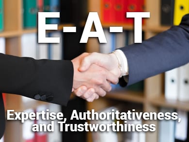 E-A-T Expertise, Authoritativeness, and Trustworthiness. Two people shaking hands.