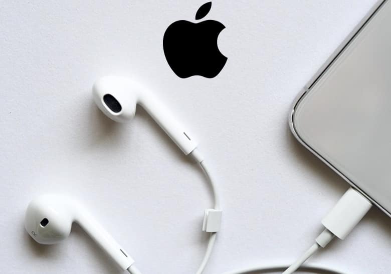 Apple logo and Apple white headphones.