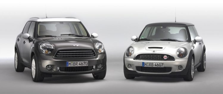 Dark grey Mini Cooper Countryman beside Mini Cooper