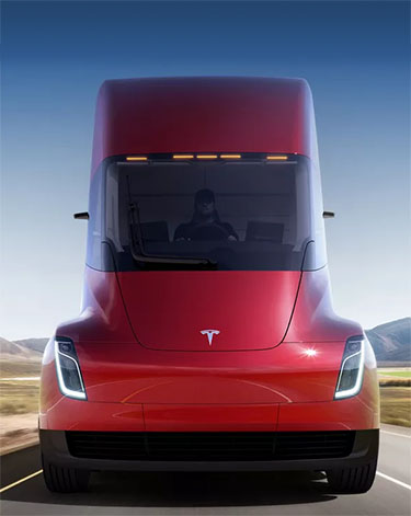 Red Tesla Semi Truck on desert highway.