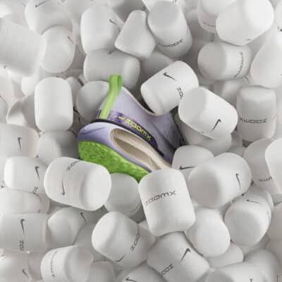 A nike shoe buried in marshmallows.