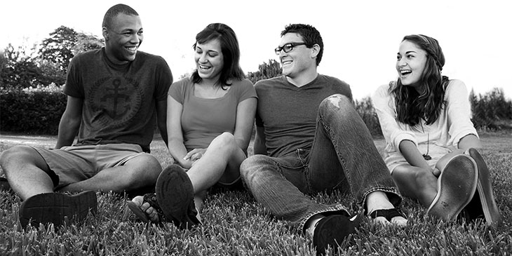 A group of peers on a double date.