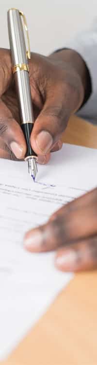 Man signing a contract